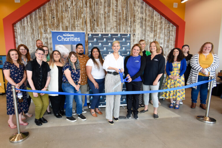 Emancipet staff cutting ribbon at Austin Dental and Surgical Center Grand Opening